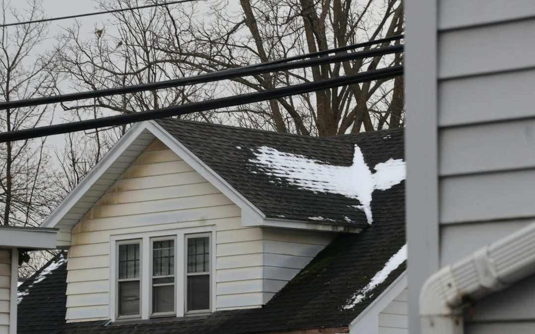 How to Spot Wind Damage to Your Roof Before Ice Sets In